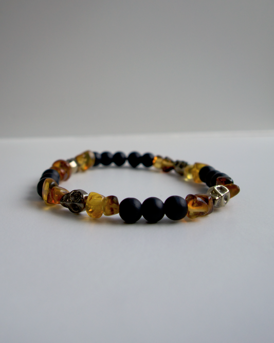 PULSERA CALAVERA DE HOMBRE LAVA Y ÁMBAR ELÁSTICA