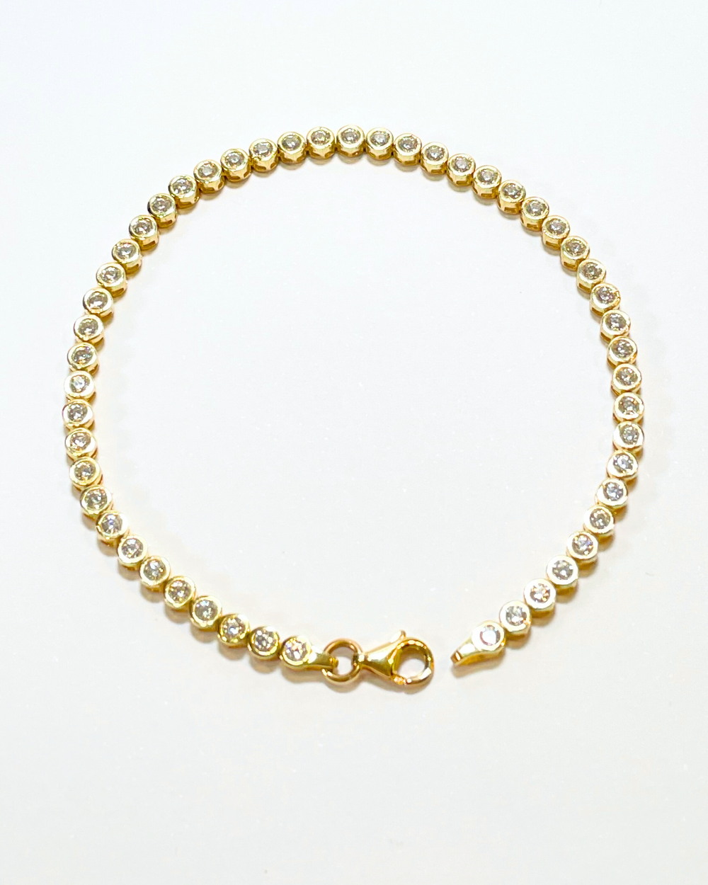 PULSERA TENIS ORO AMARILLO 14K. SKU:ORO72