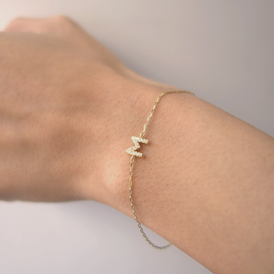PULSERA DE INICIAL M CON CIRCONIAS DE ORO 14K