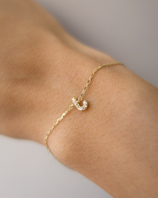 PULSERA DE INICIAL J CON CIRCONIAS DE ORO 14K SKU:OR0447