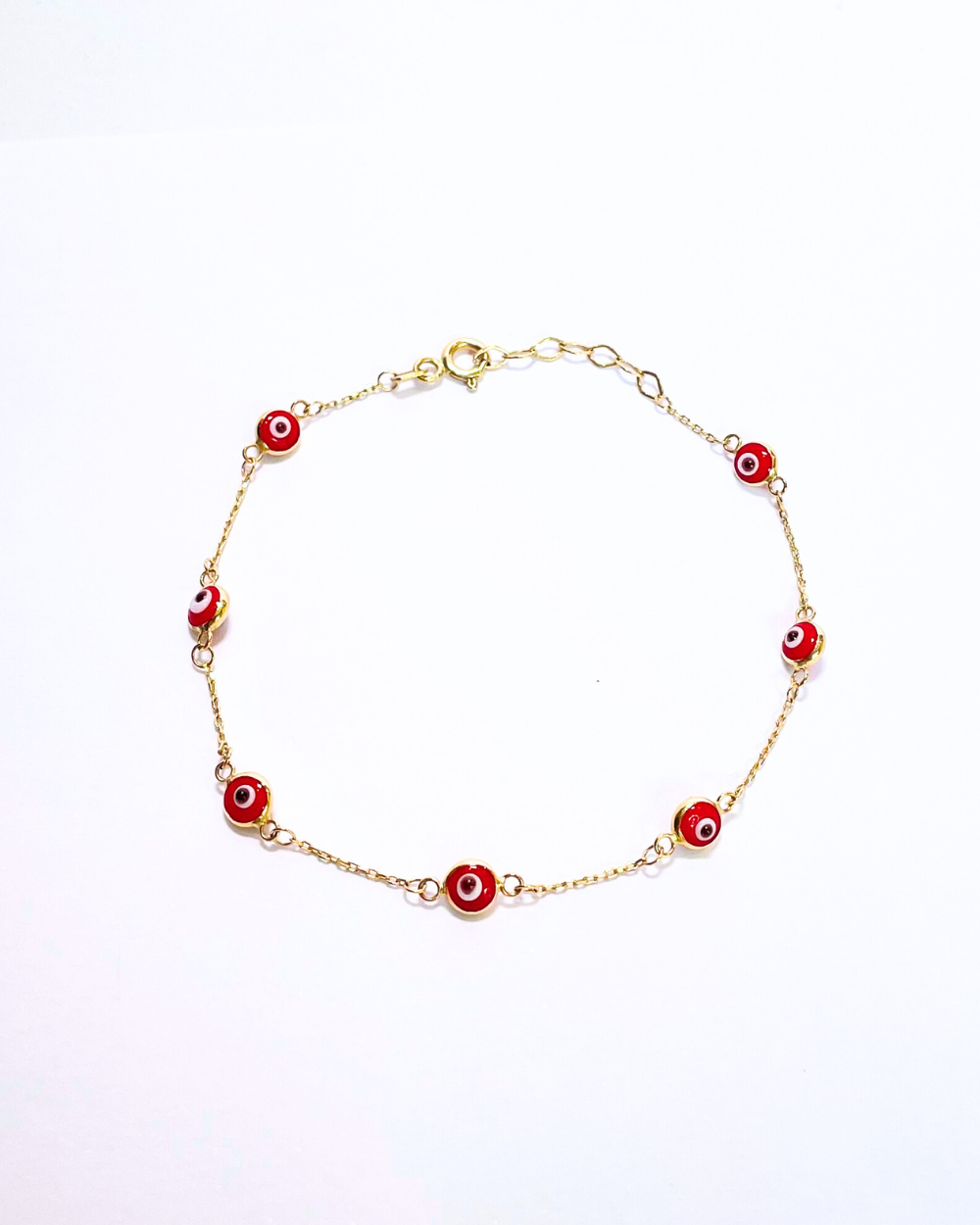 PULSERA OJOS TURCOS ROJOS ORO 14K SKU ORO55