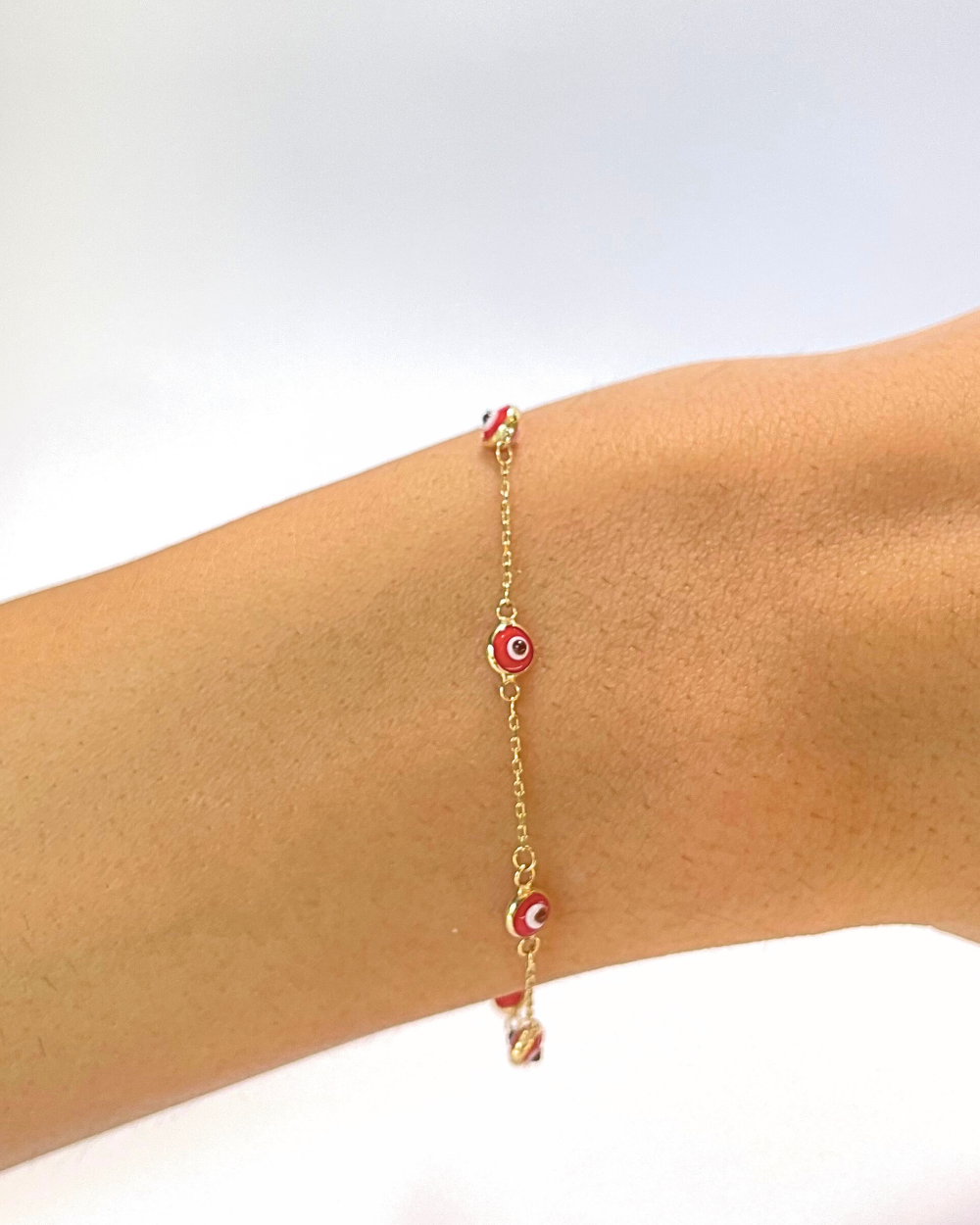 PULSERA OJOS TURCOS ROJOS ORO 14K SKU ORO55